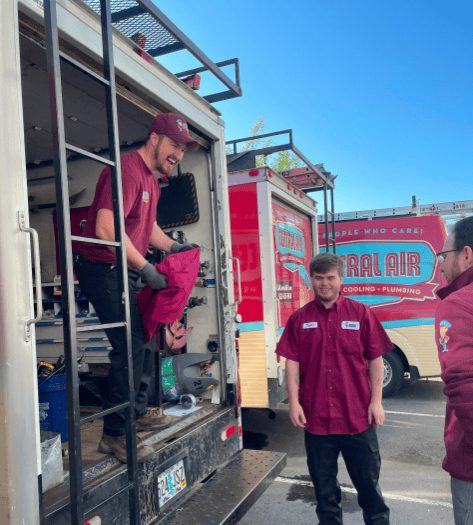 Central Air technicians after HVAC installation in a Portland home.