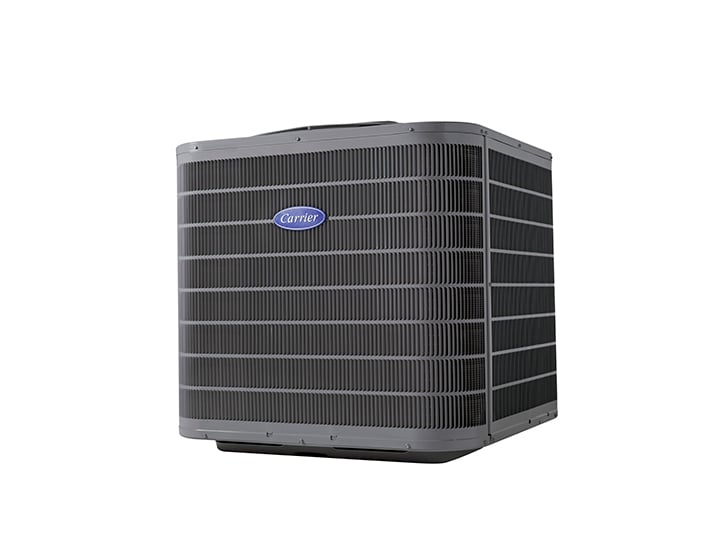 Gray residential HVAC air conditioning condenser unit with blue Carrier logo